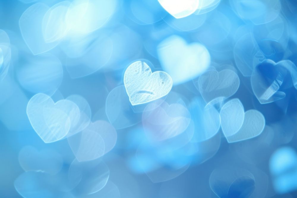 Heart shape boke blue illuminated backgrounds.