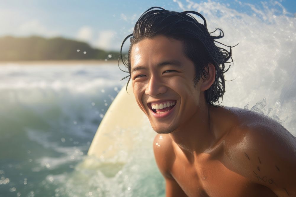 Asian surfer surfing laughing smiling smile.