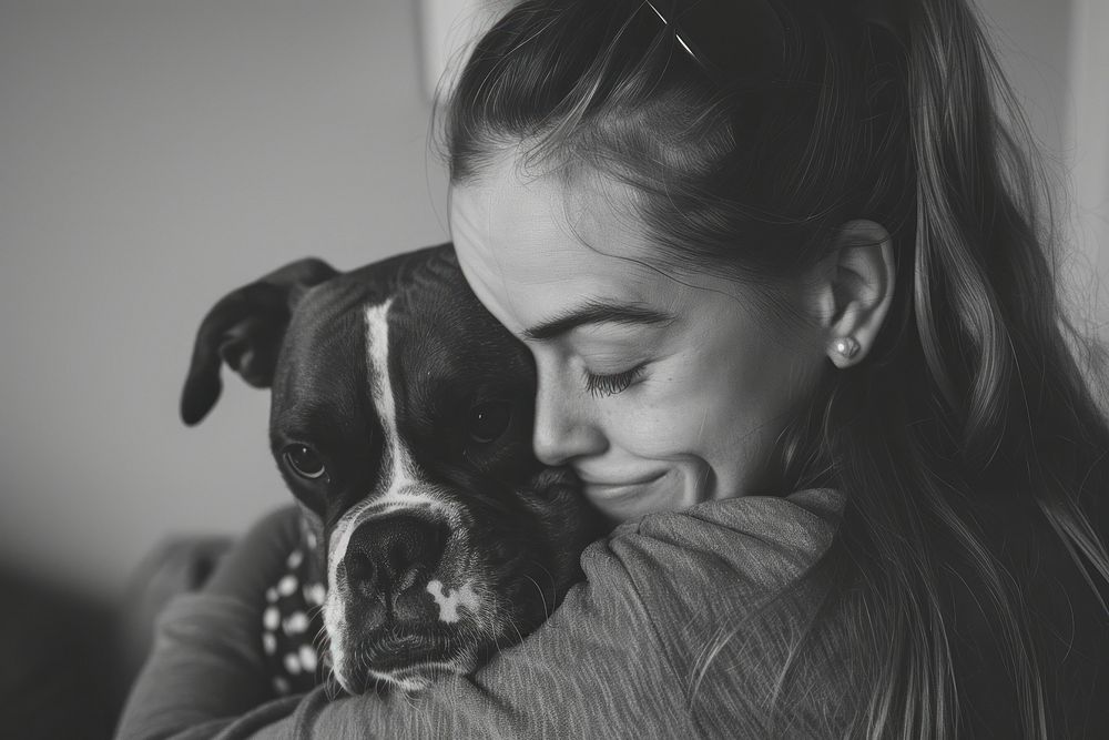 Woman hugging boxer dog portrait mammal animal.