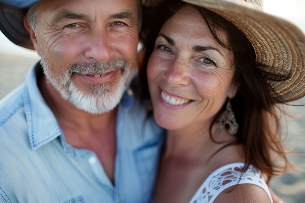 Middle-aged couple portrait summer teeth.