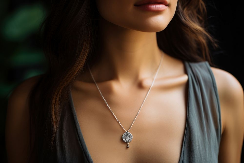 Buddism necklace on woman jewelry pendant locket.