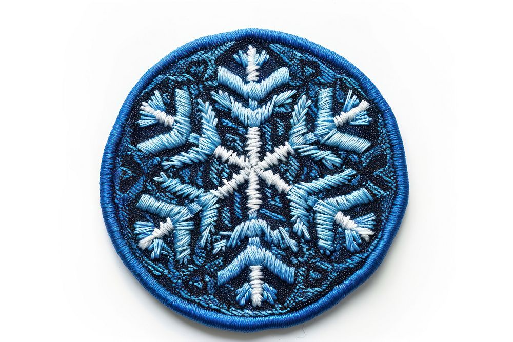 Snowflake circle frame pattern blue white background.