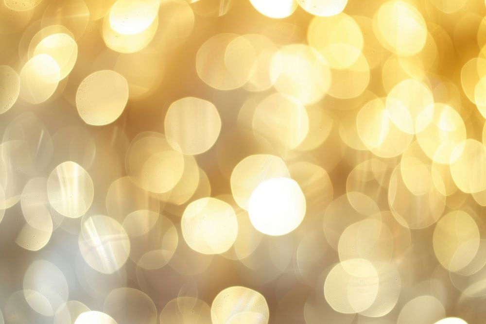 White and light yellow bokeh backgrounds gold illuminated.