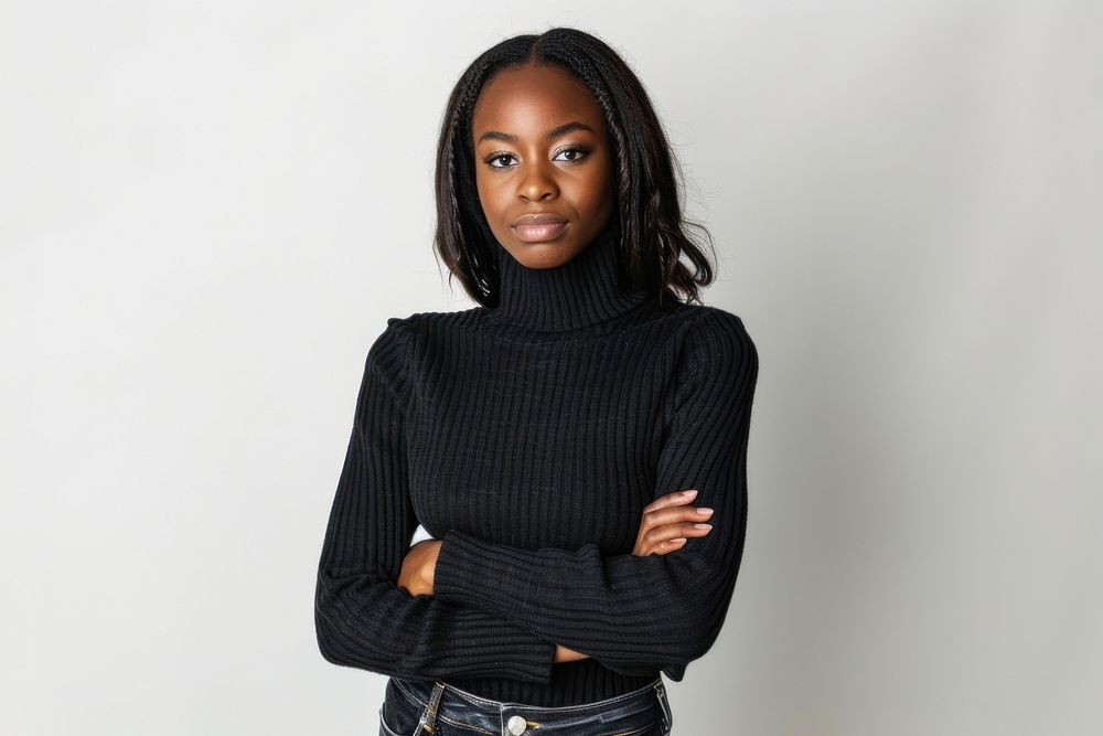 Beautiful positive african american woman portrait standing sweater.