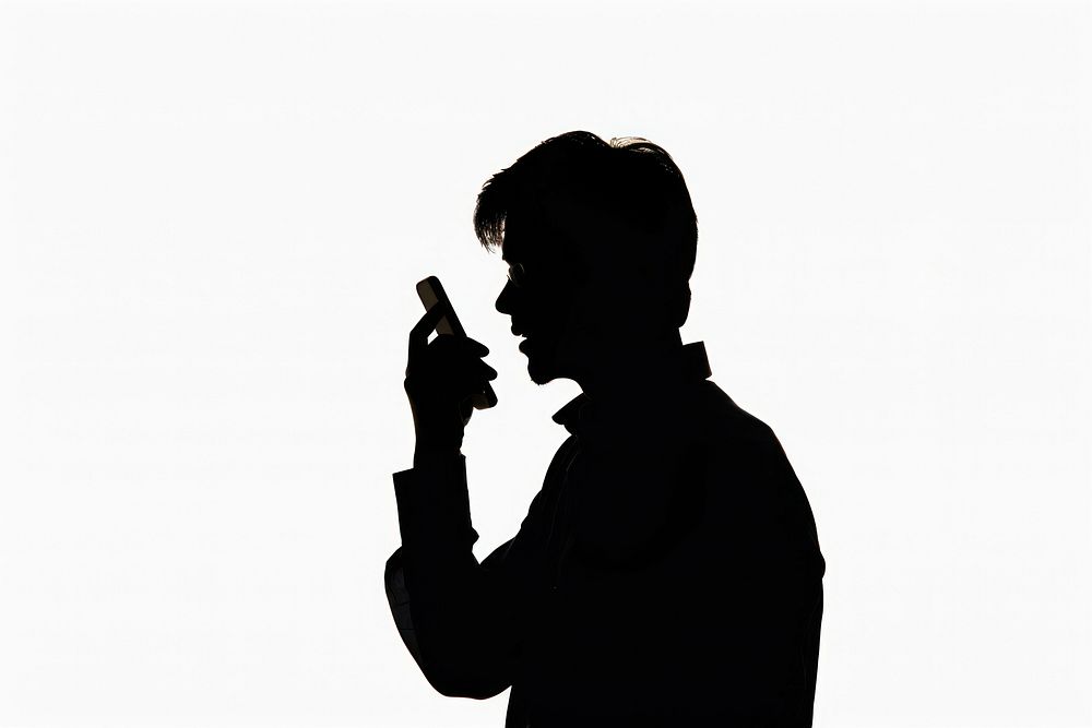 A man talking on a cell phone silhouette adult white background.