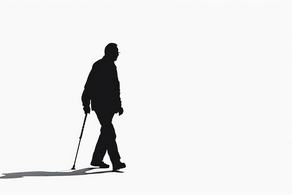 A man walking with a cane silhouette footwear white.