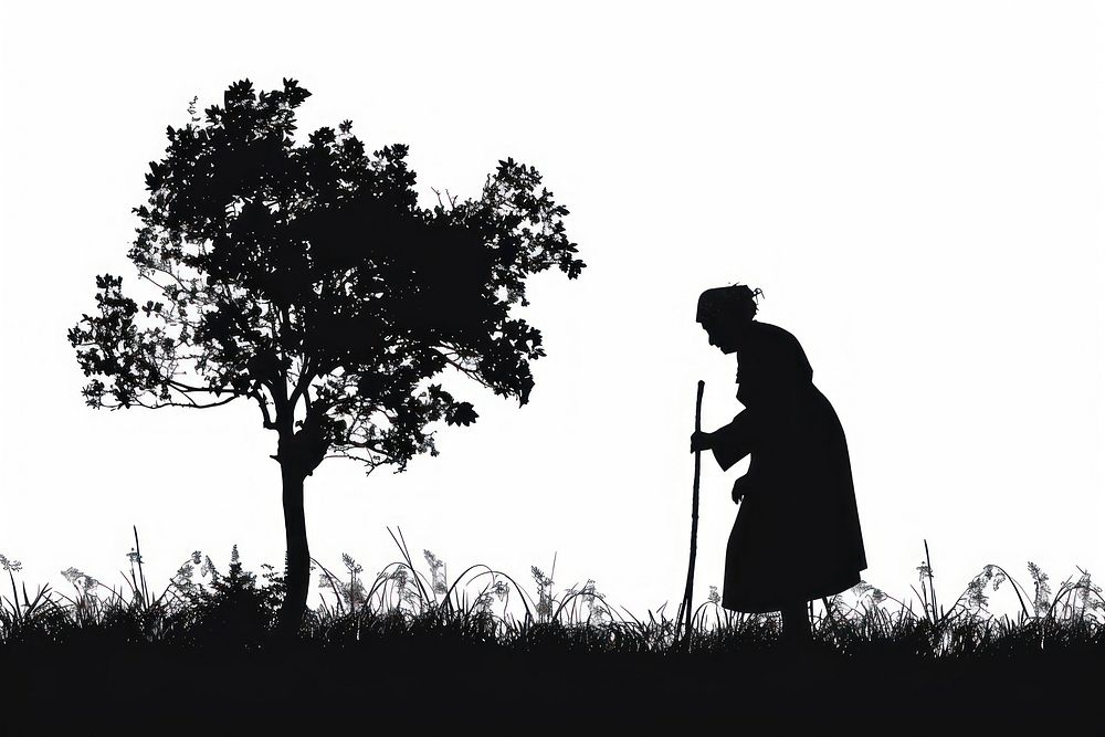 An old woman working with cane silhouette adult backlighting.