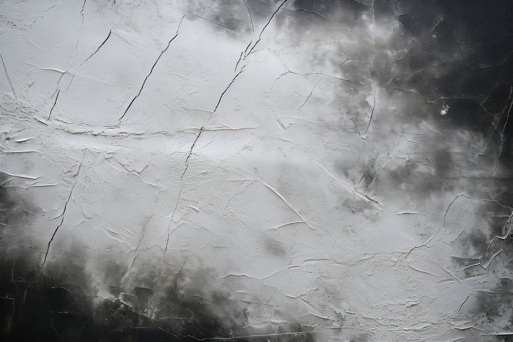 White chalk marks in black texture wall architecture.