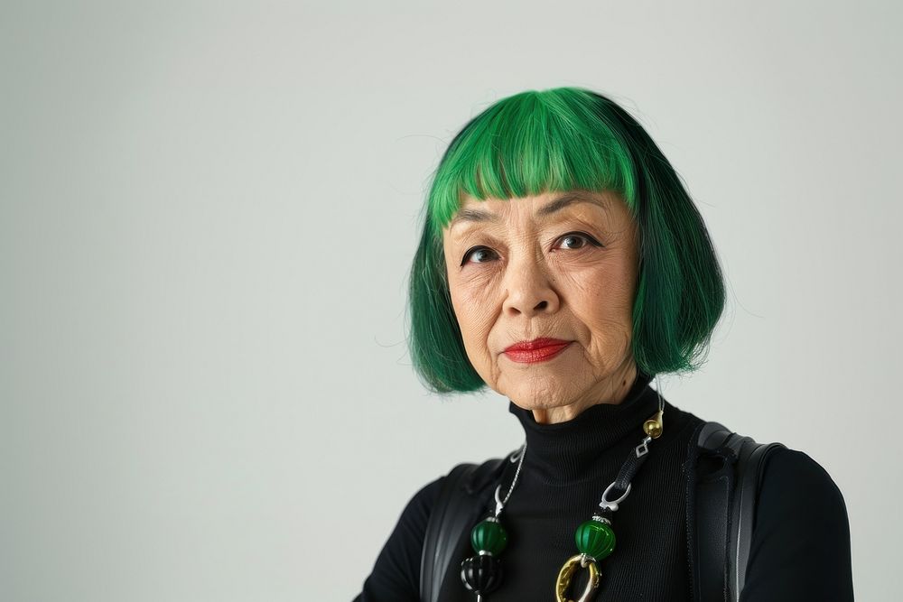 American old woman with vivid green black hair necklace portrait jewelry.