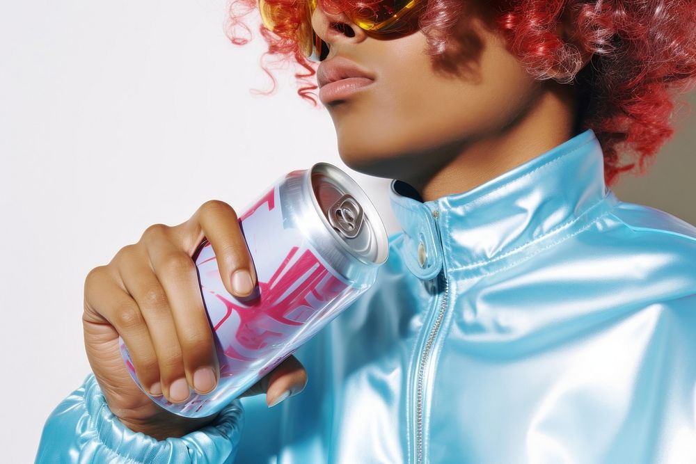 Man drinking soda can fashion refreshment hairstyle.