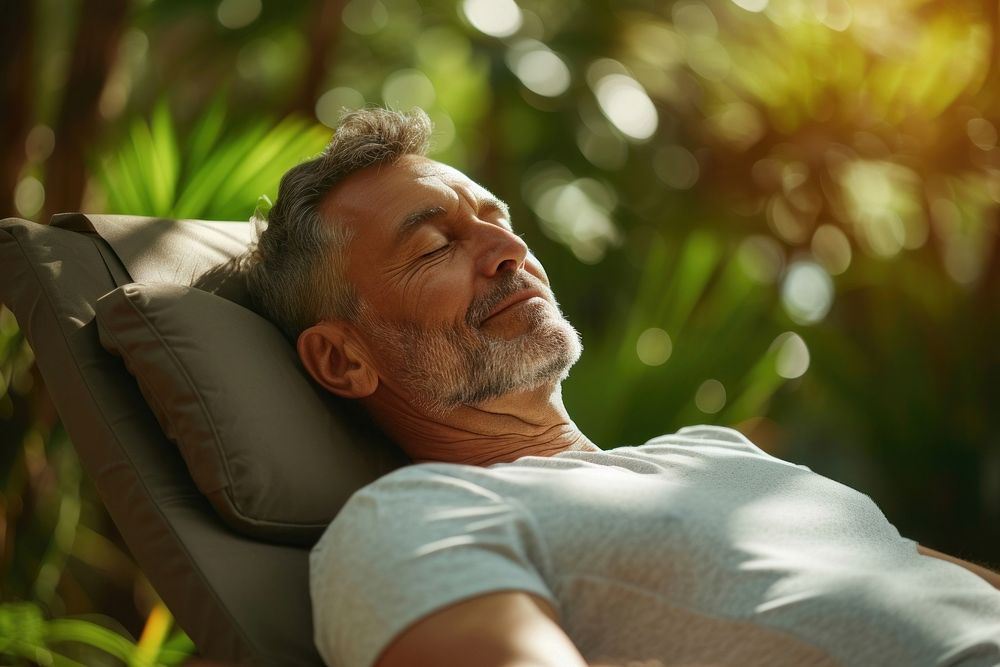 Middle age man relaxing with back massage adult contemplation tranquility.