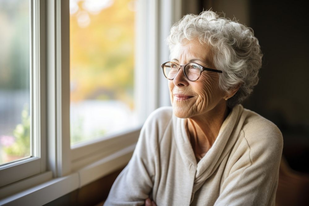 The elderly female mentor glasses adult contemplation.