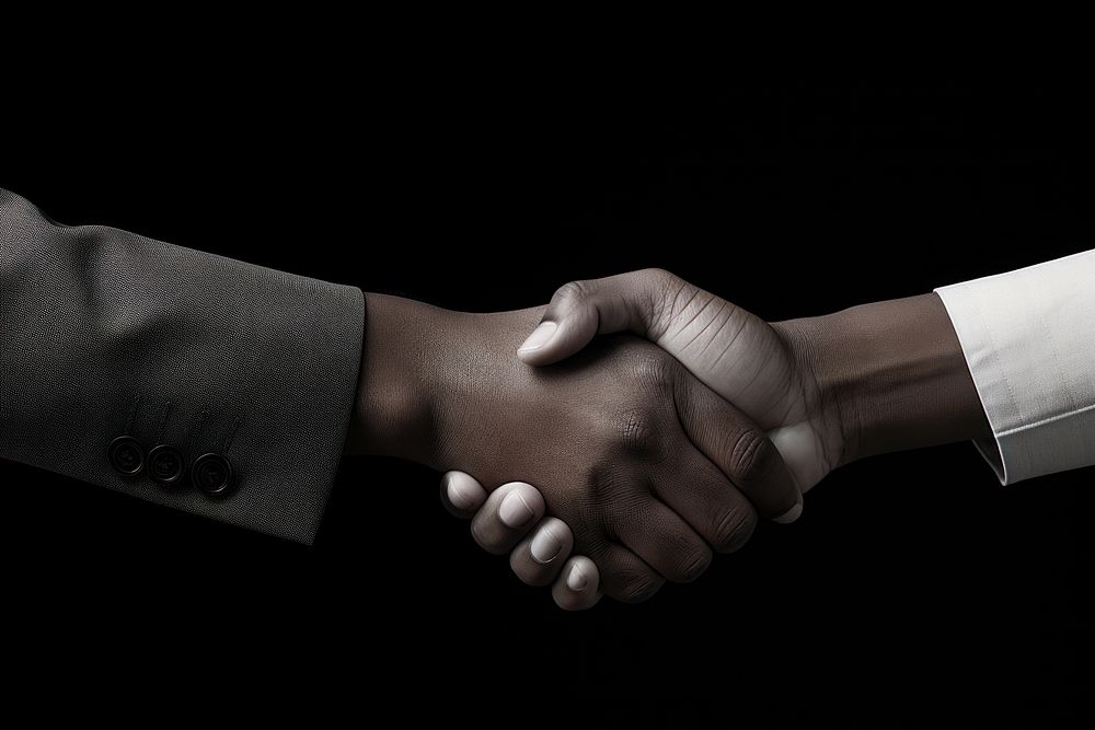 Business handshake black monochrome agreement.