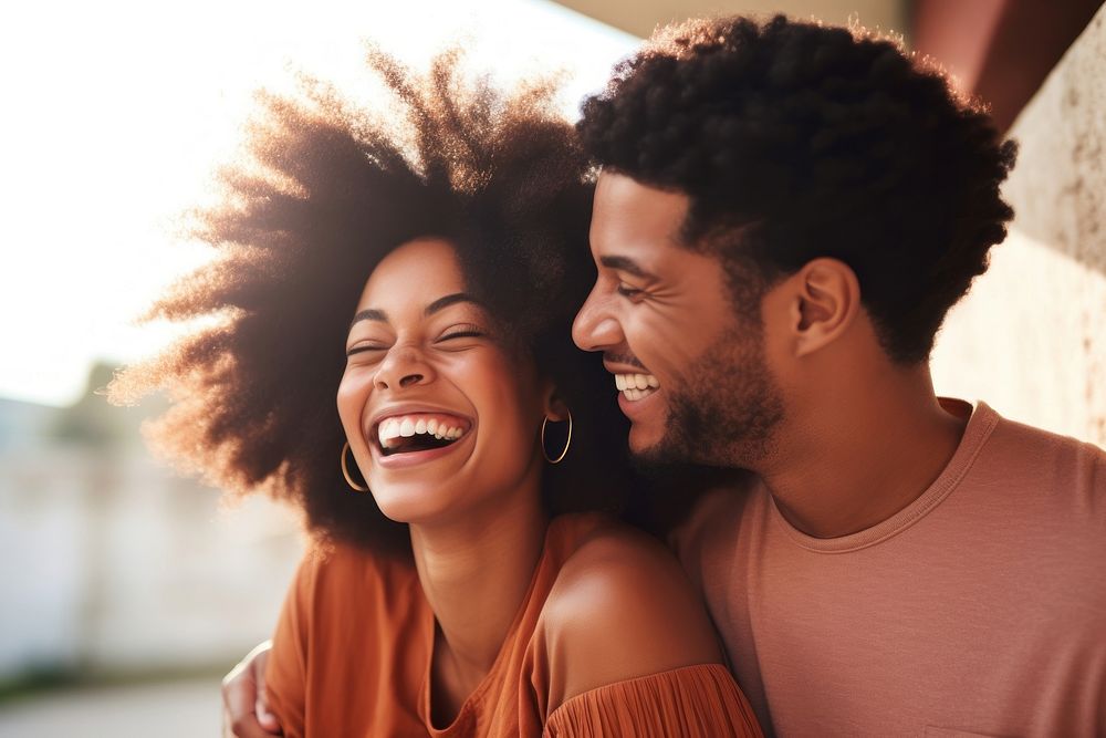 African american woman laughing with her couple smile adult togetherness.