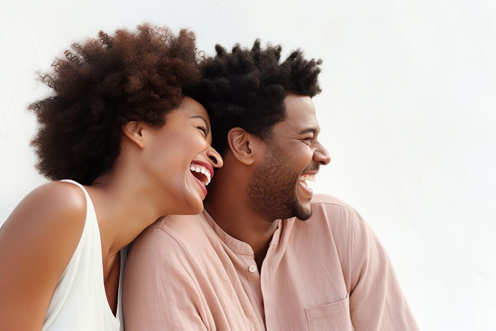 African american woman laughing with her couple adult togetherness affectionate.