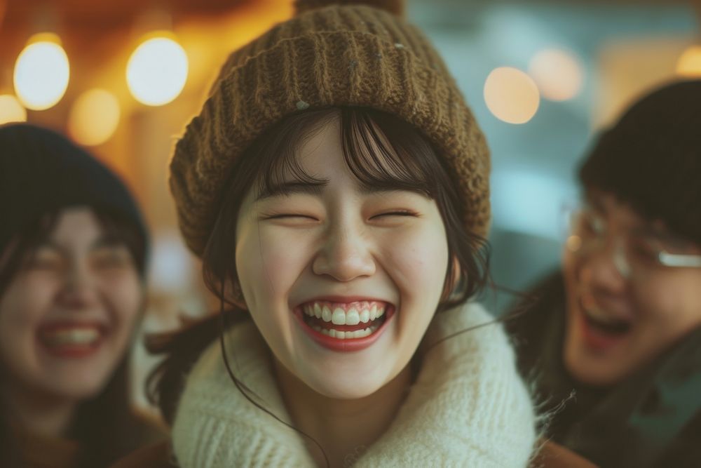 Korean girl laughing with her couple adult smile togetherness.