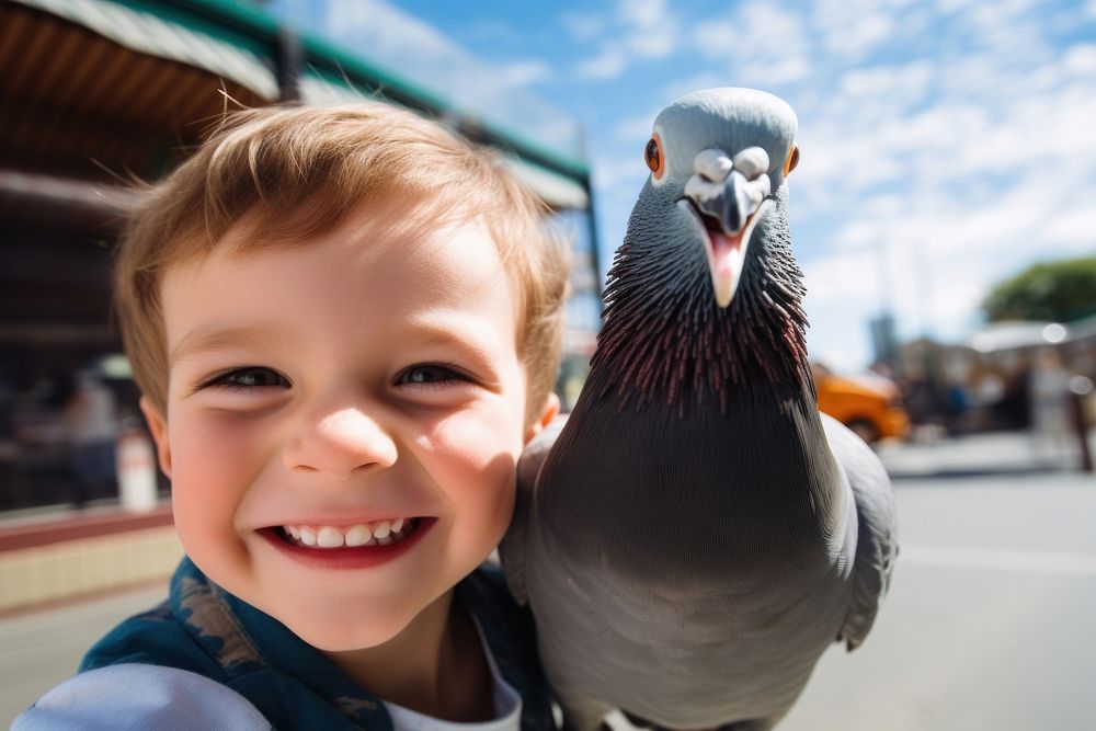 Pigeon and kid portrait smiling animal.