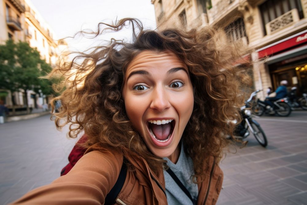 Woman excited face shouting portrait headshot.