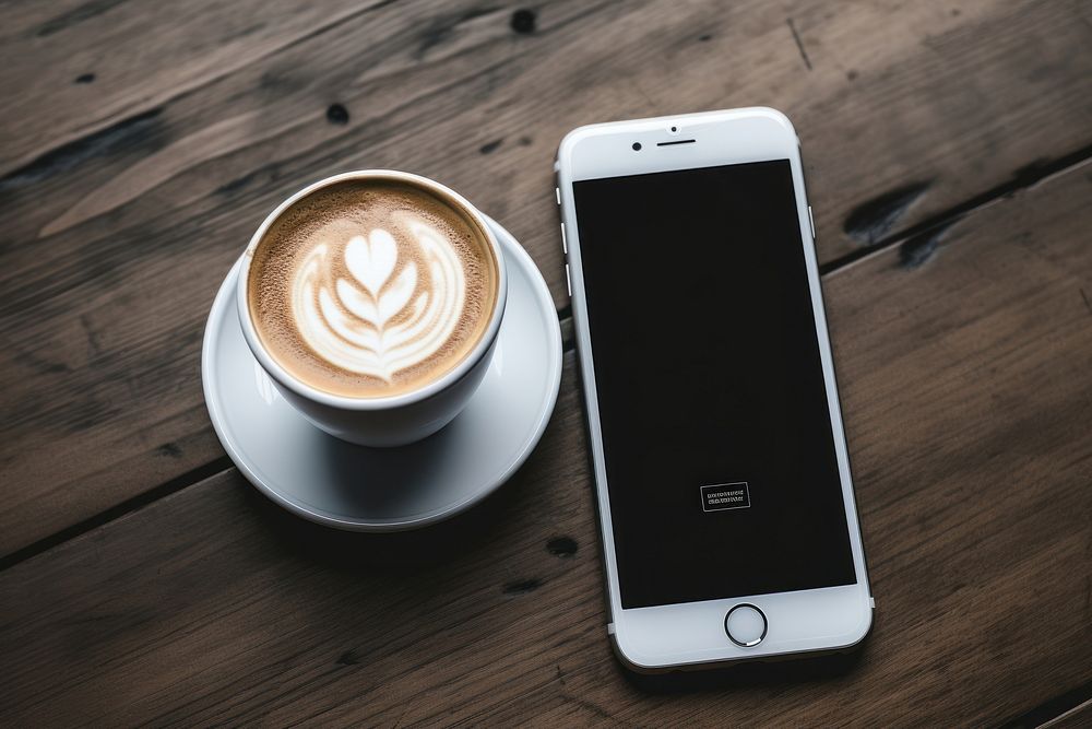 Coffee screen drink phone.