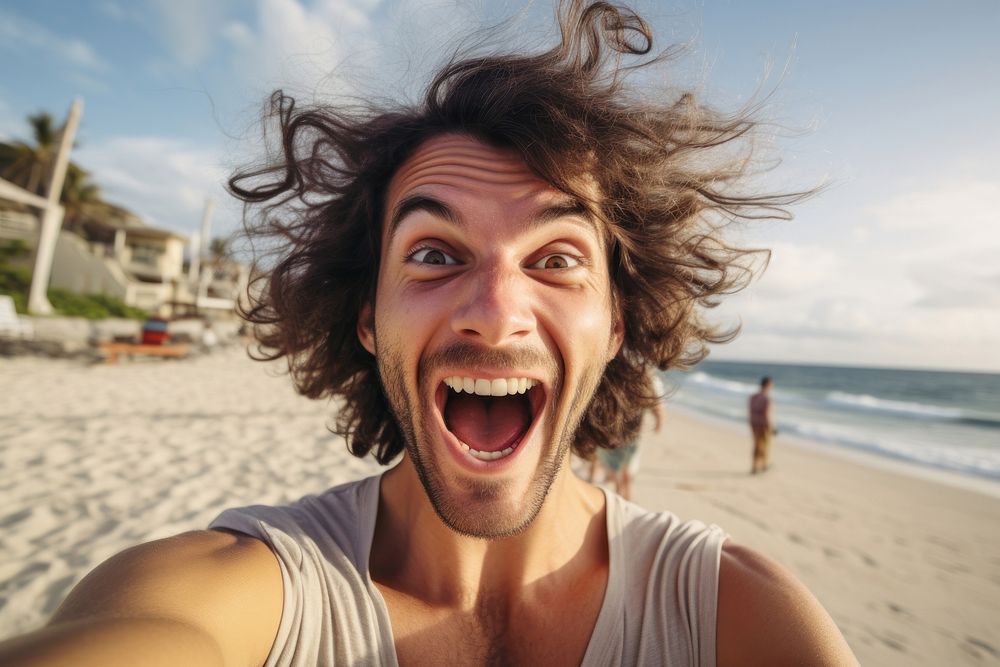 Man excited face portrait selfie beach.