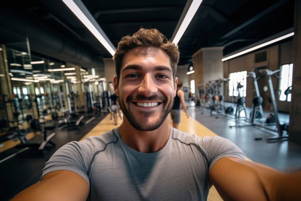 Man happy face selfie gym portrait.