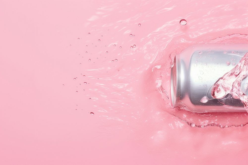 Aluminum can on pink water pattern refreshment bottle stain.