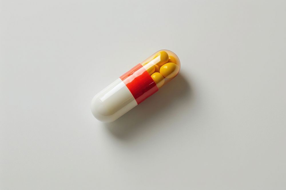 Capsule medicine pill white background medication.