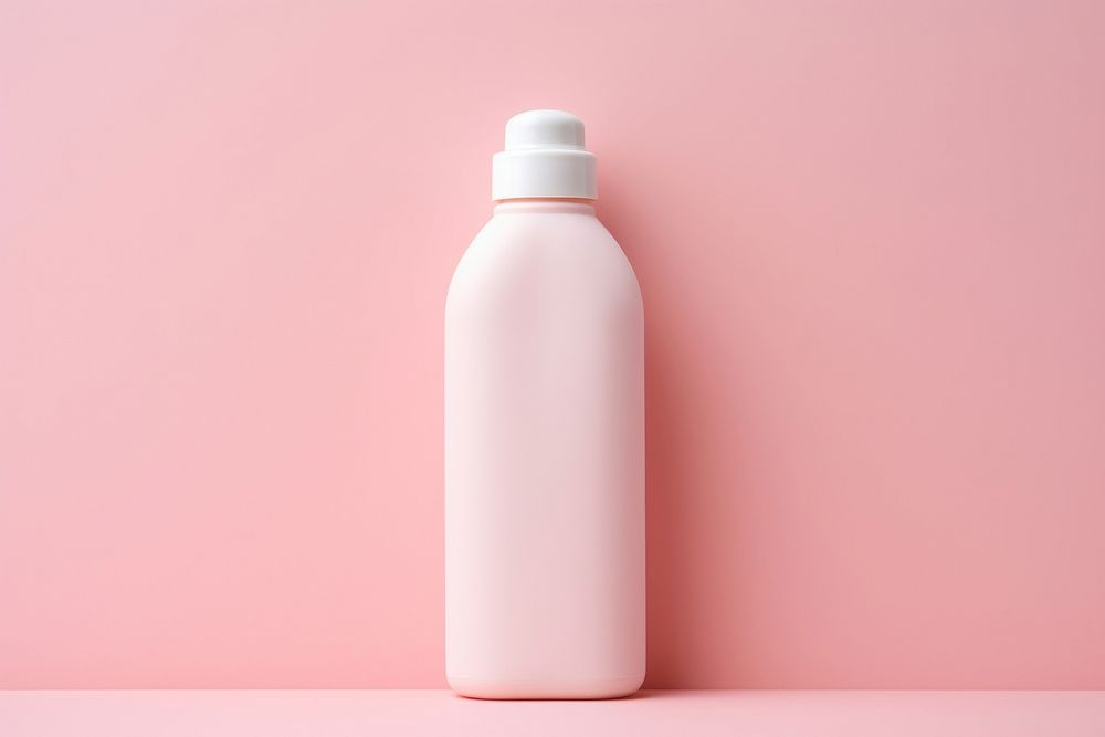 Cream bottle on pink water pattern refreshment drinkware container.