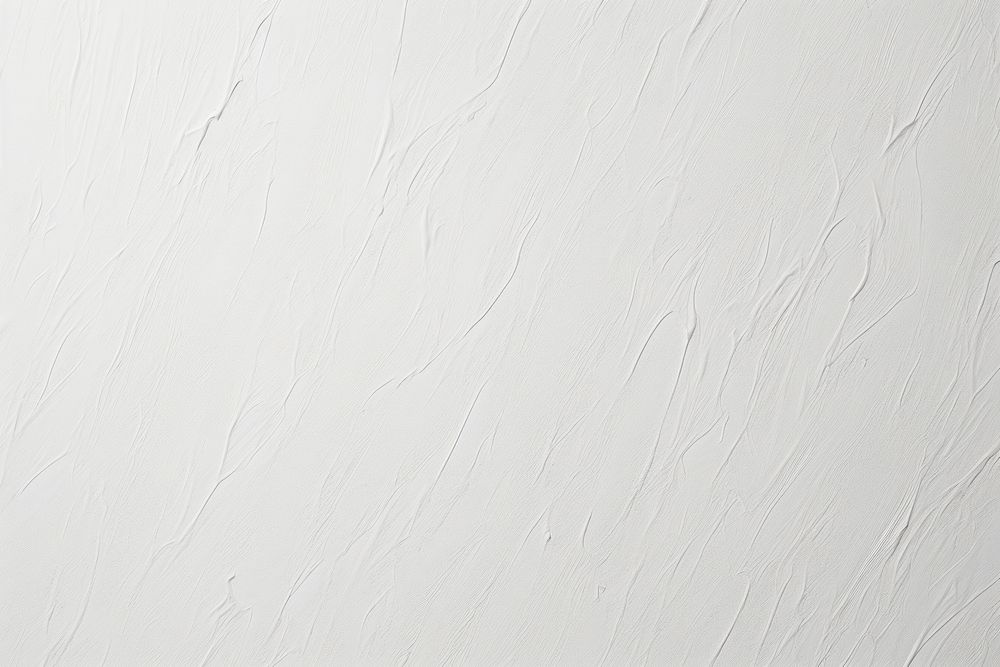 A paper texture of scribble white backgrounds textured.