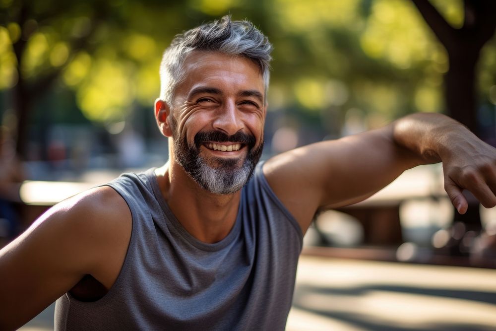 Man stretching before exercise smile laughing adult.