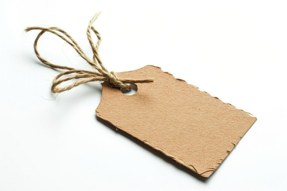Craft paper tag white background cardboard textured.