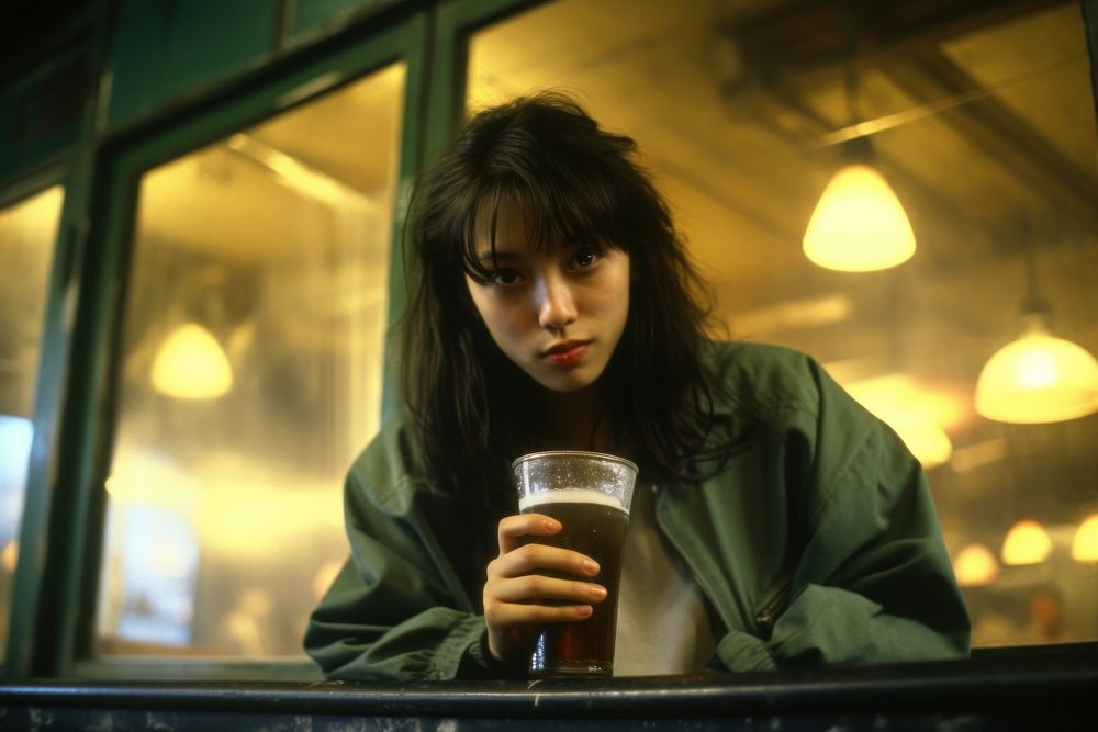Argentine girl beer drinking holding.