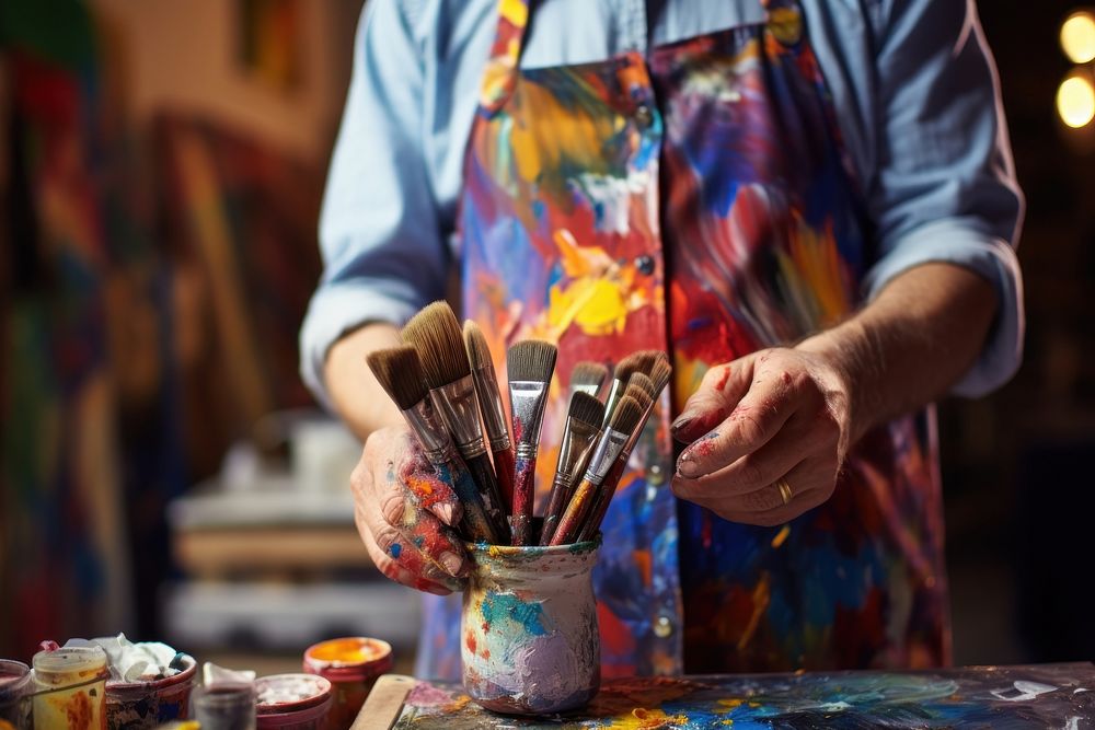 Painter holding paintbrush workshop painter art.