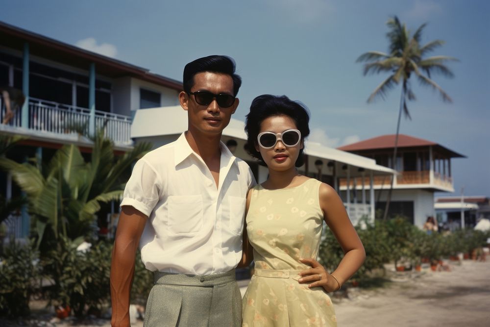Thai man and woman architecture sunglasses portrait.