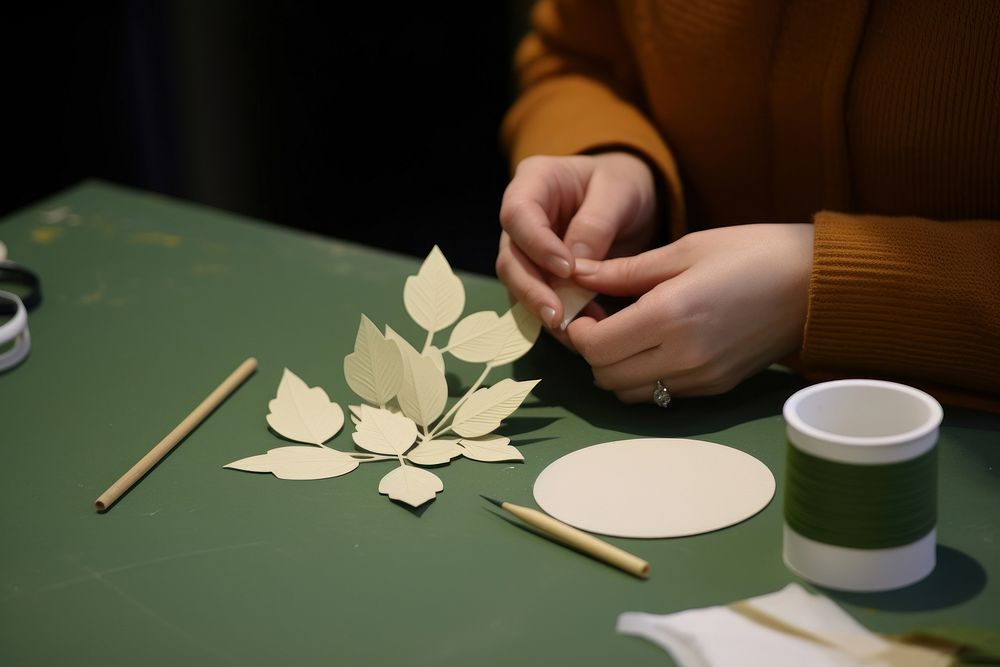 Paper craft plant table hand.
