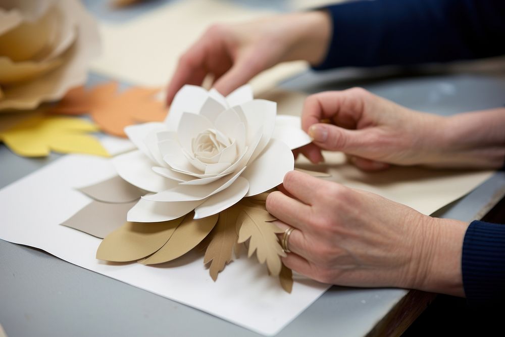 Paper craft flower hand art.