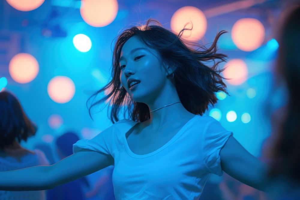 Asian woman dancing adult disco.