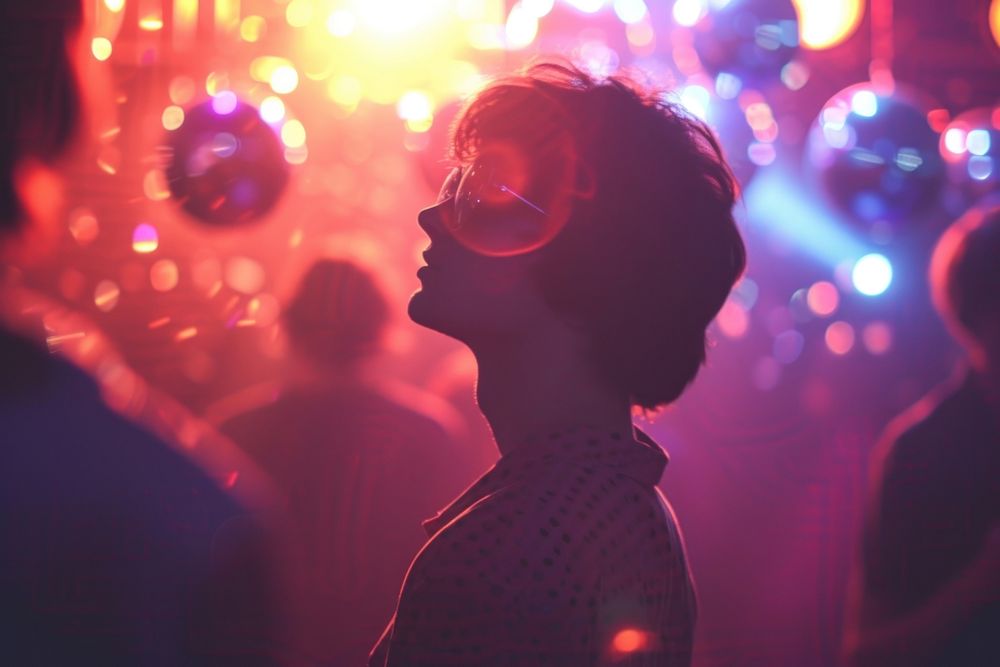 Disco party nightclub illuminated celebration.
