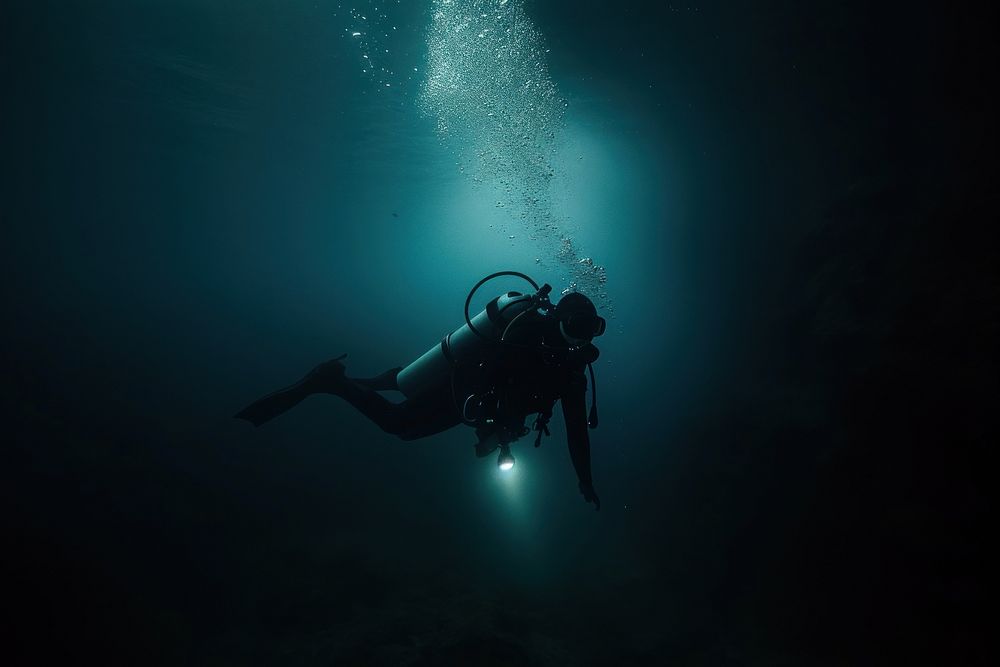 Diver exploring the underwater with deep-sea creatures recreation adventure outdoors.