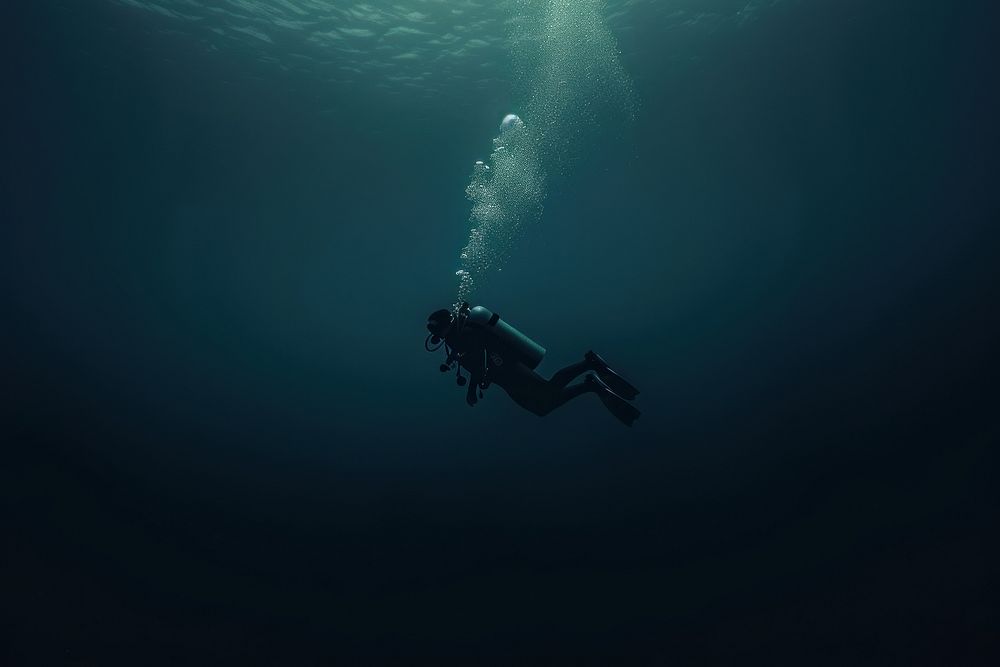 Diver in the deep dark Underwater Sea underwater adventure outdoors.