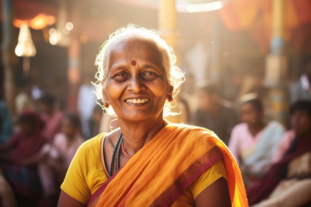 The elderly female volunteer portrait adult smile.