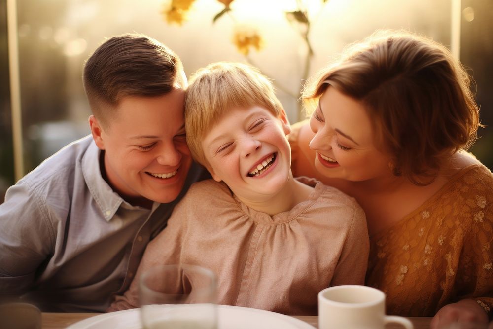 A kid reading with his parents laughing adult child.