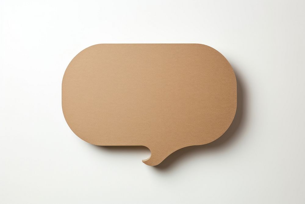 2d speech bubble symbol made of cardboard paper simplicity rectangle textured.