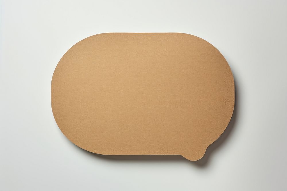 2d speech bubble symbol made of cardboard paper simplicity rectangle textured.