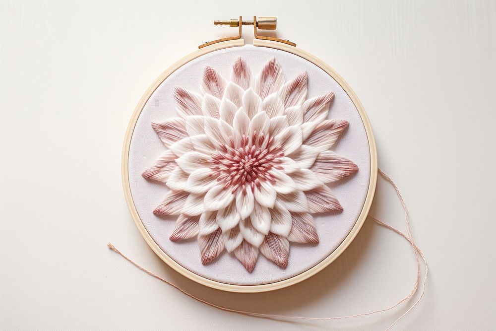 Embroidery hoop with flower in embroidery style pattern creativity textile.
