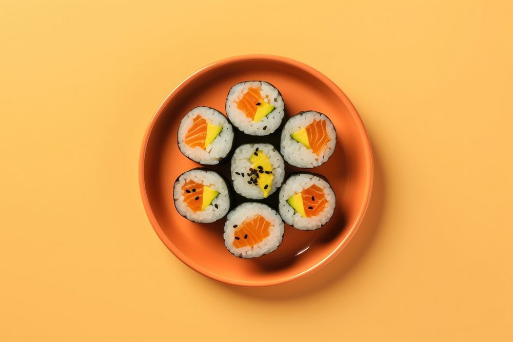Yellow sushi plate food.