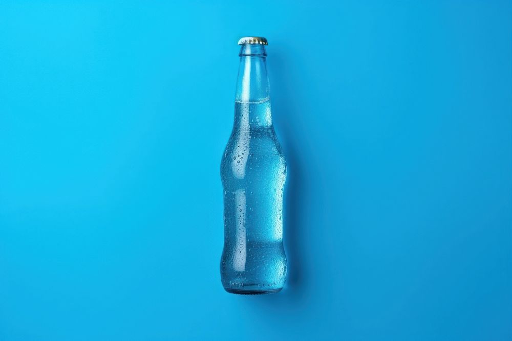 Soda bottle drink blue blue background.