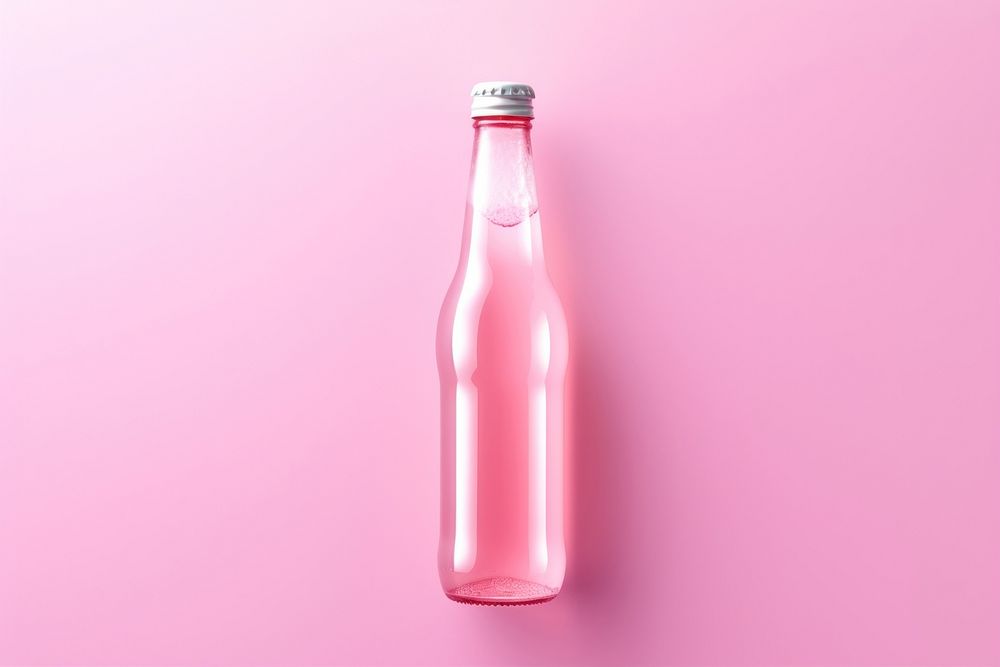 Soda bottle with white lable glass drink pink.