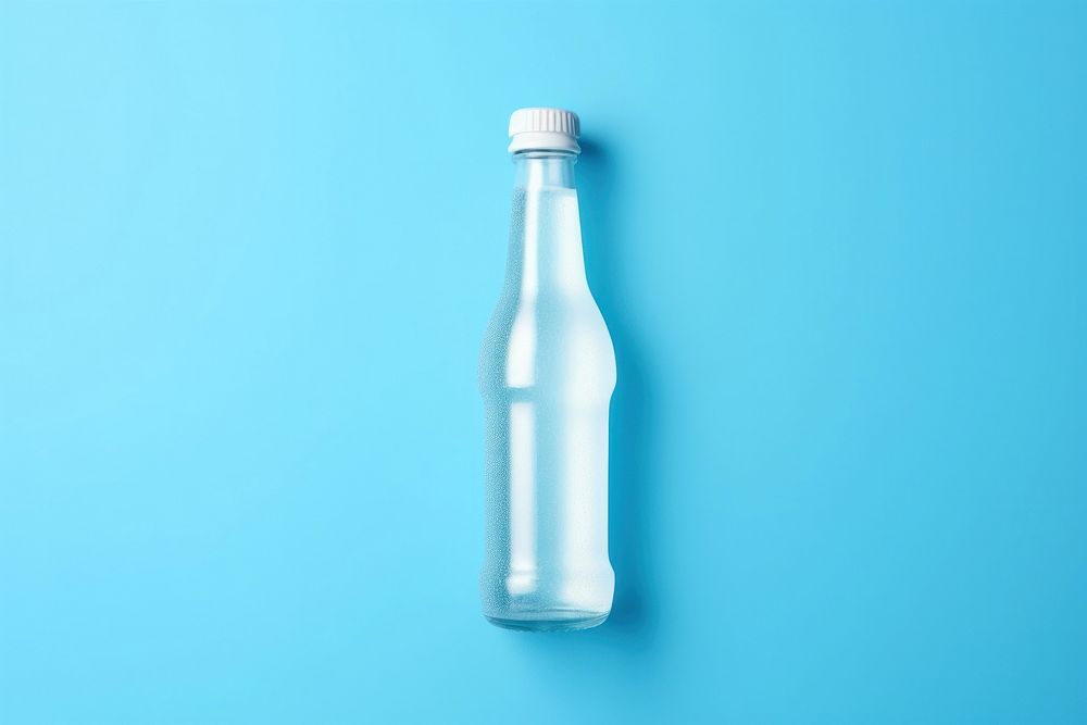 Soda bottle with white lable drink blue blue background.