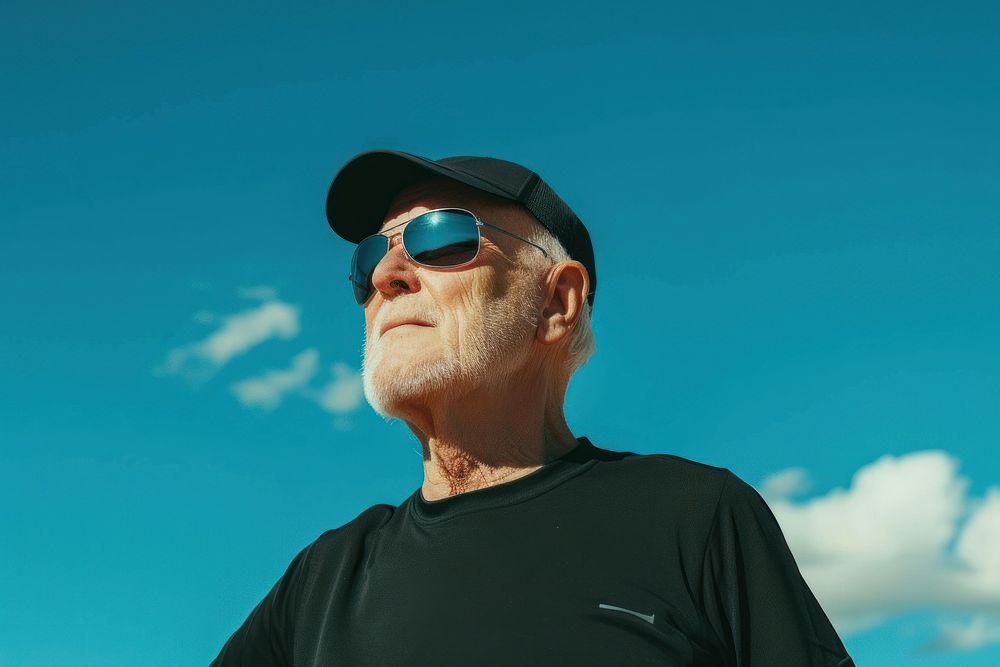 Granddad jocking sunglasses portrait outdoors.